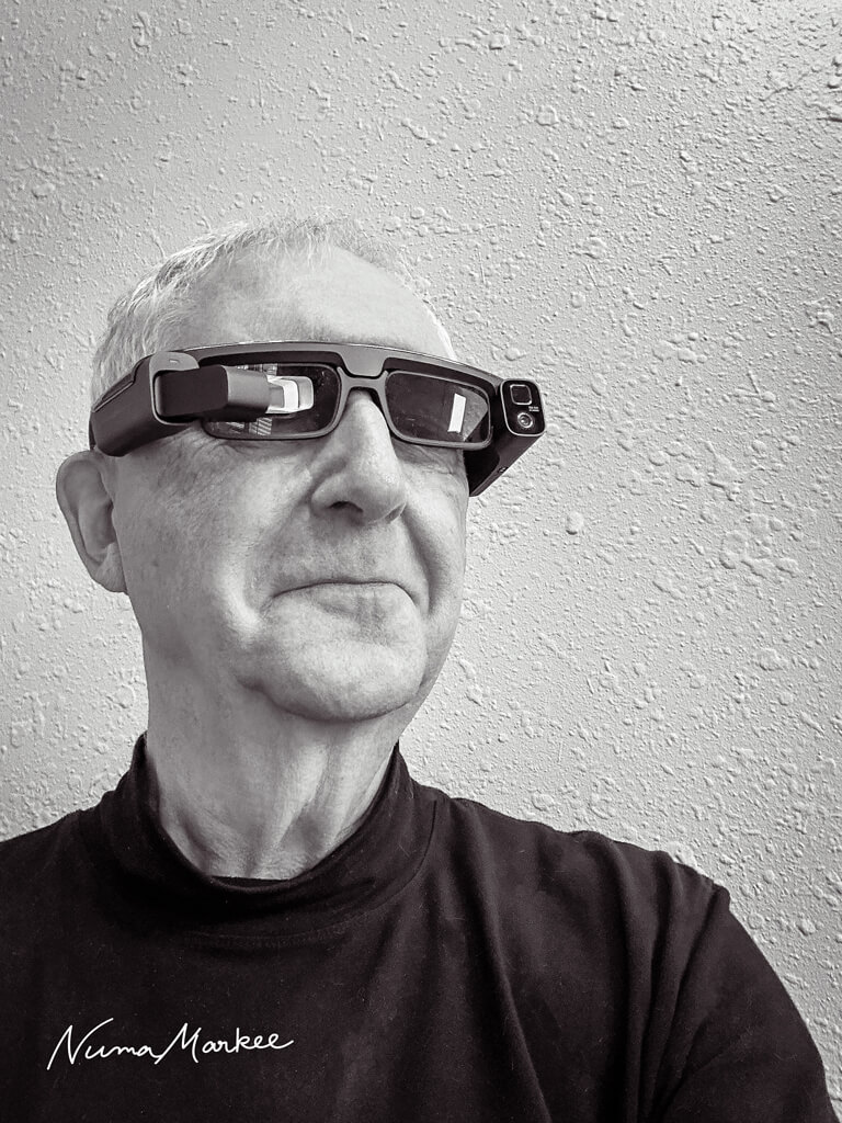 Man wearing smart glasses.